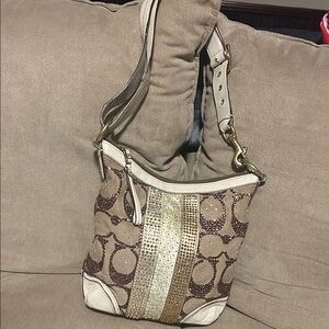 Coach J0668-10542 with crystals.